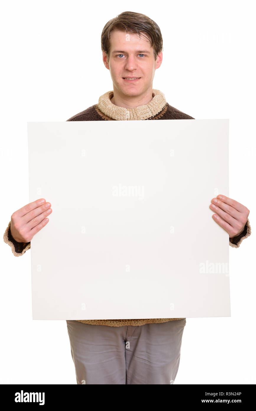 Portrait of happy handsome Caucasian man holding copyspace Stock Photo