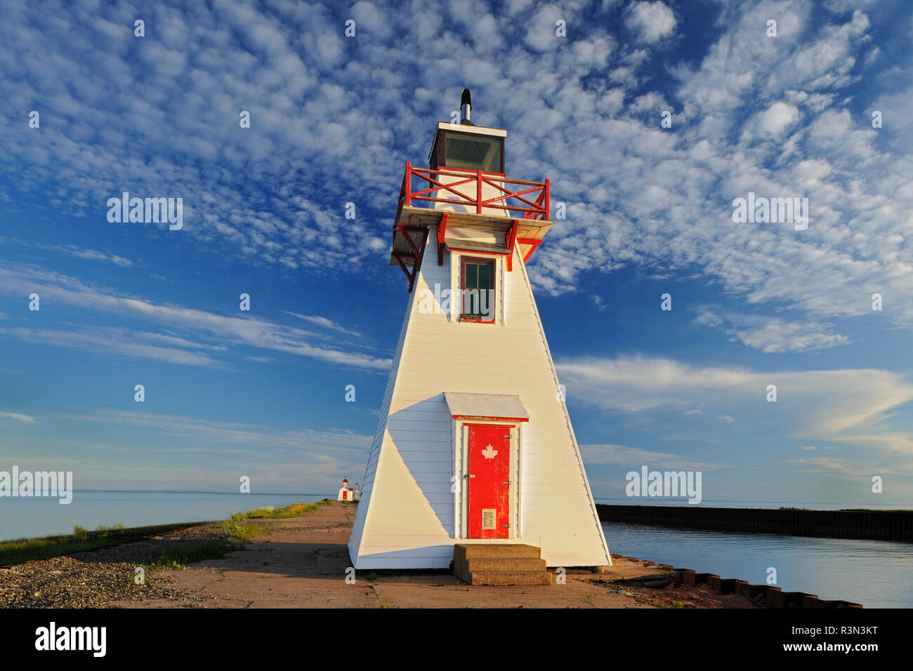 Canada, Prince Edward Island, Wood Islands. Lighthouse at sunset Stock