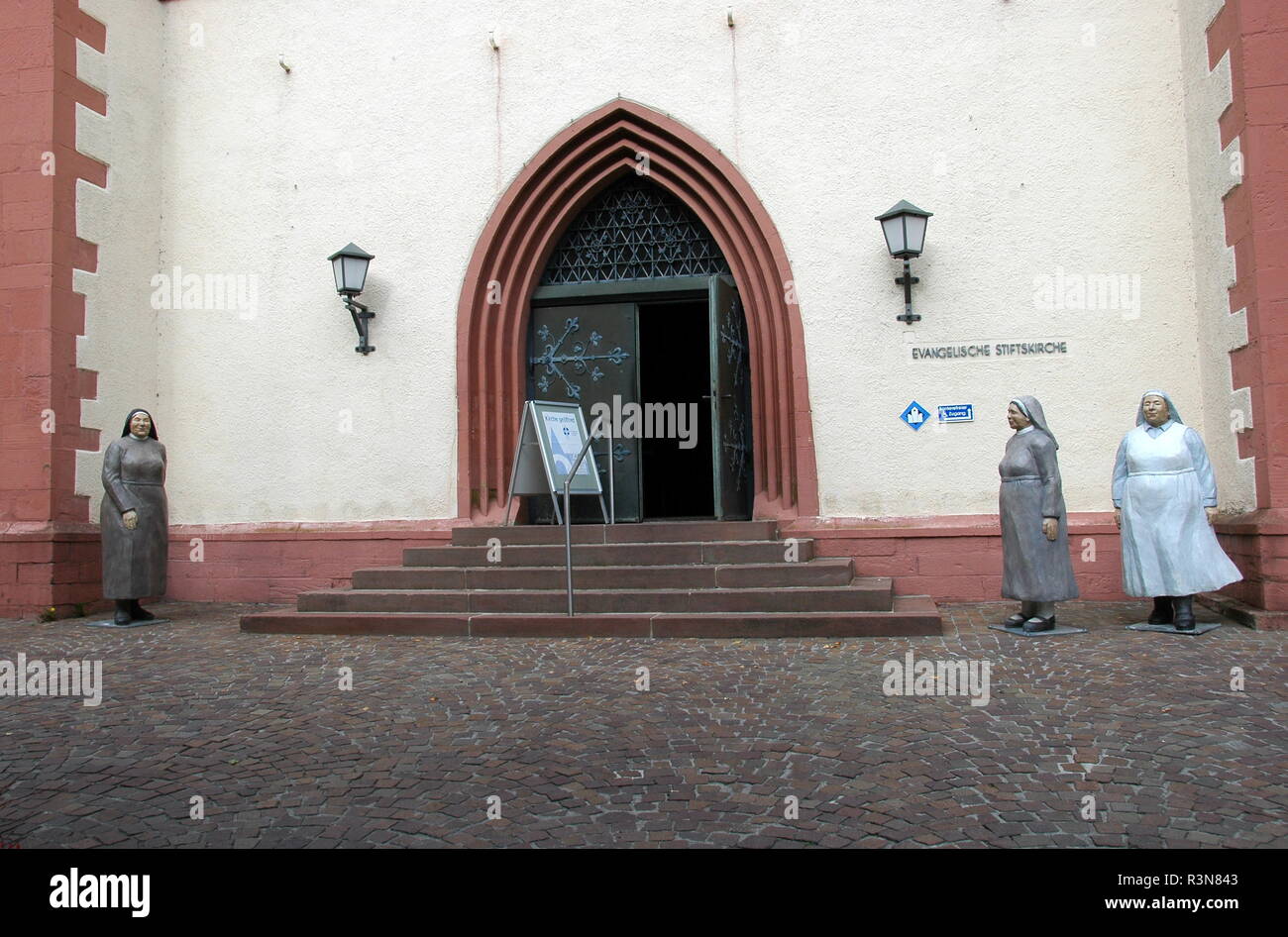 everyday people in front of church in mosbach / baden Stock Photo