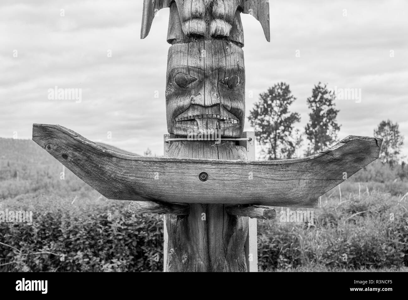 Canada, British Columbia, Hazelton. Black and white of Gitxsan and Wet'suwet'en totem pole. Stock Photo