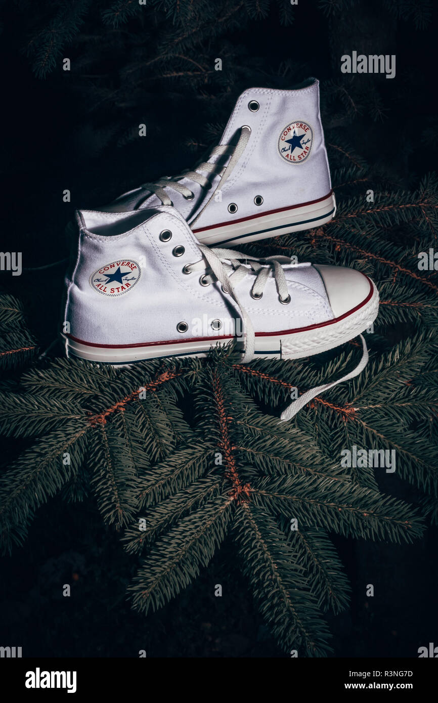 ESKISEHIR, TURKEY - MAY 28, 2010: Converse Sports Shoes hanged on pine  tree, christmas tree concept Stock Photo - Alamy