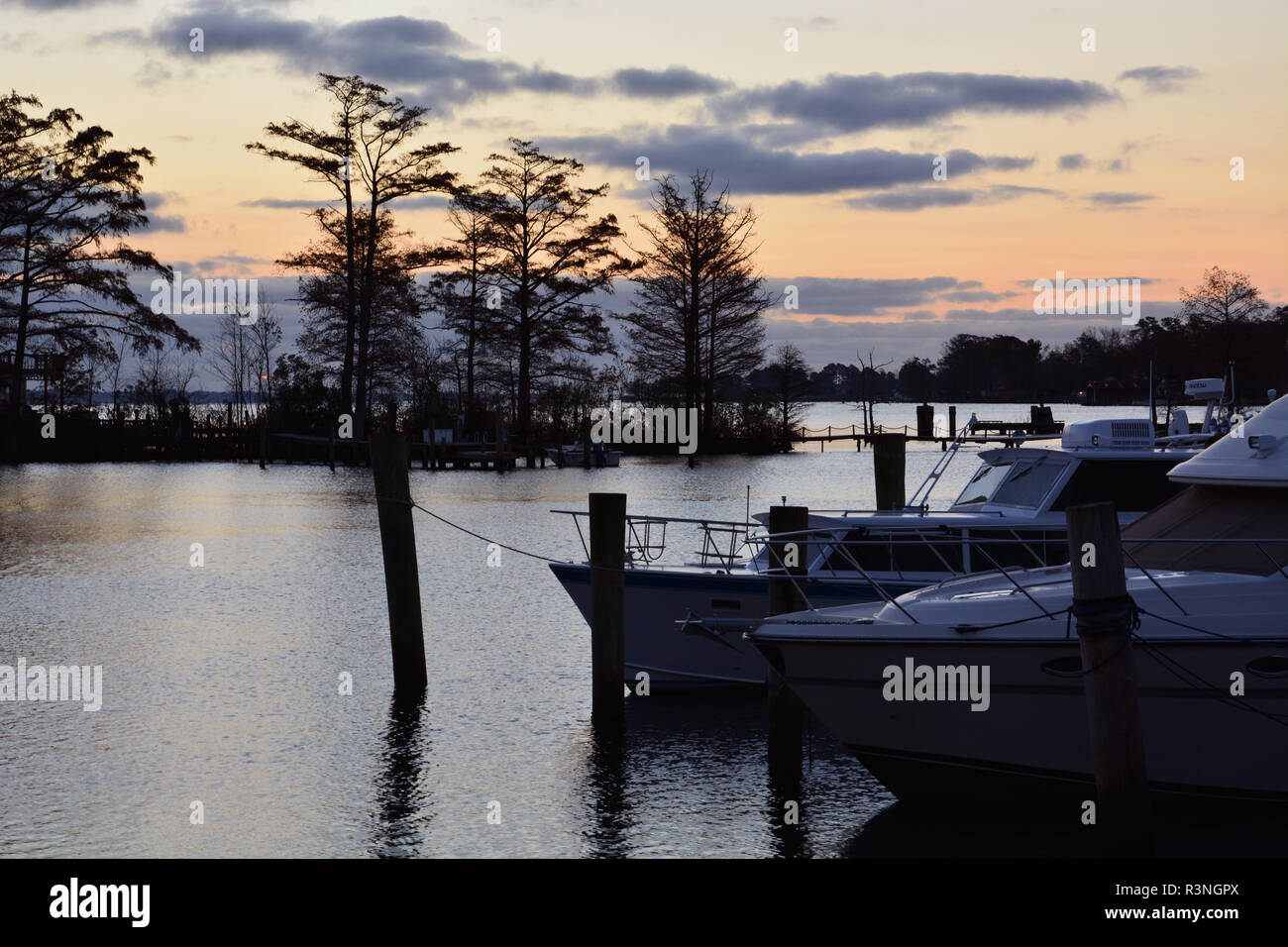 Daybreak on the Pasquotank River in Elizabeth City North Carolina where the Dismal Swamp Intracoastal Canal connects with the Albemarle Sound. Stock Photo