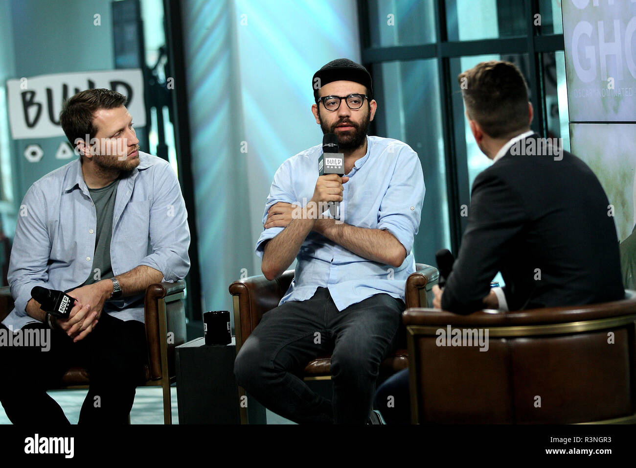 NEW YORK, NY - JULY 07:  Producer/Director Matthew Heineman and journalist Abdalaziz 'Aziz' Alhamza visit Build to discuss the new film 'City Of Ghosts' at Build Studio on July 7, 2017 in New York City.  (Photo by Steve Mack/S.D. Mack Pictures) Stock Photo