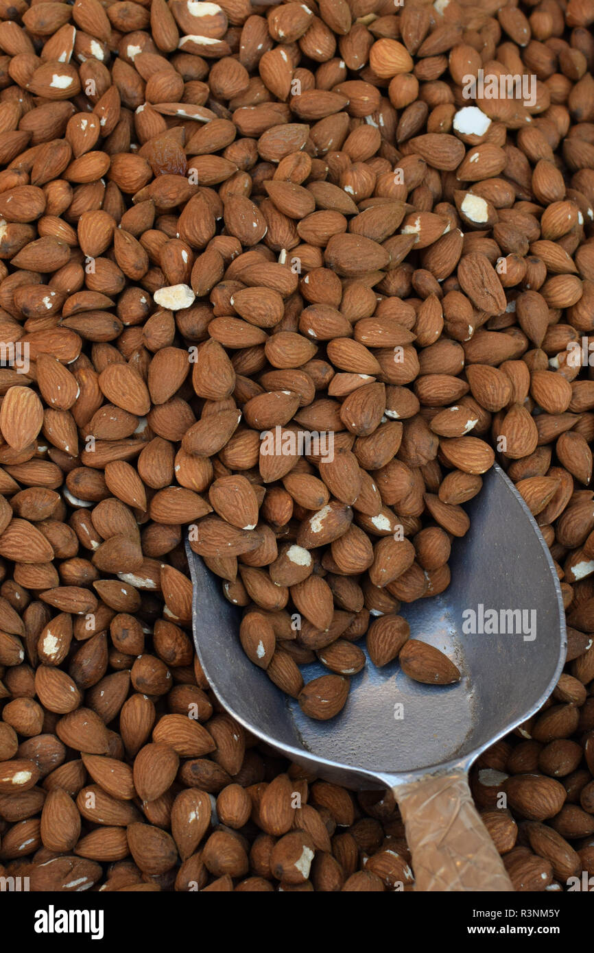 Almonds healthy snack and metal scoop. Food background Stock Photo Alamy