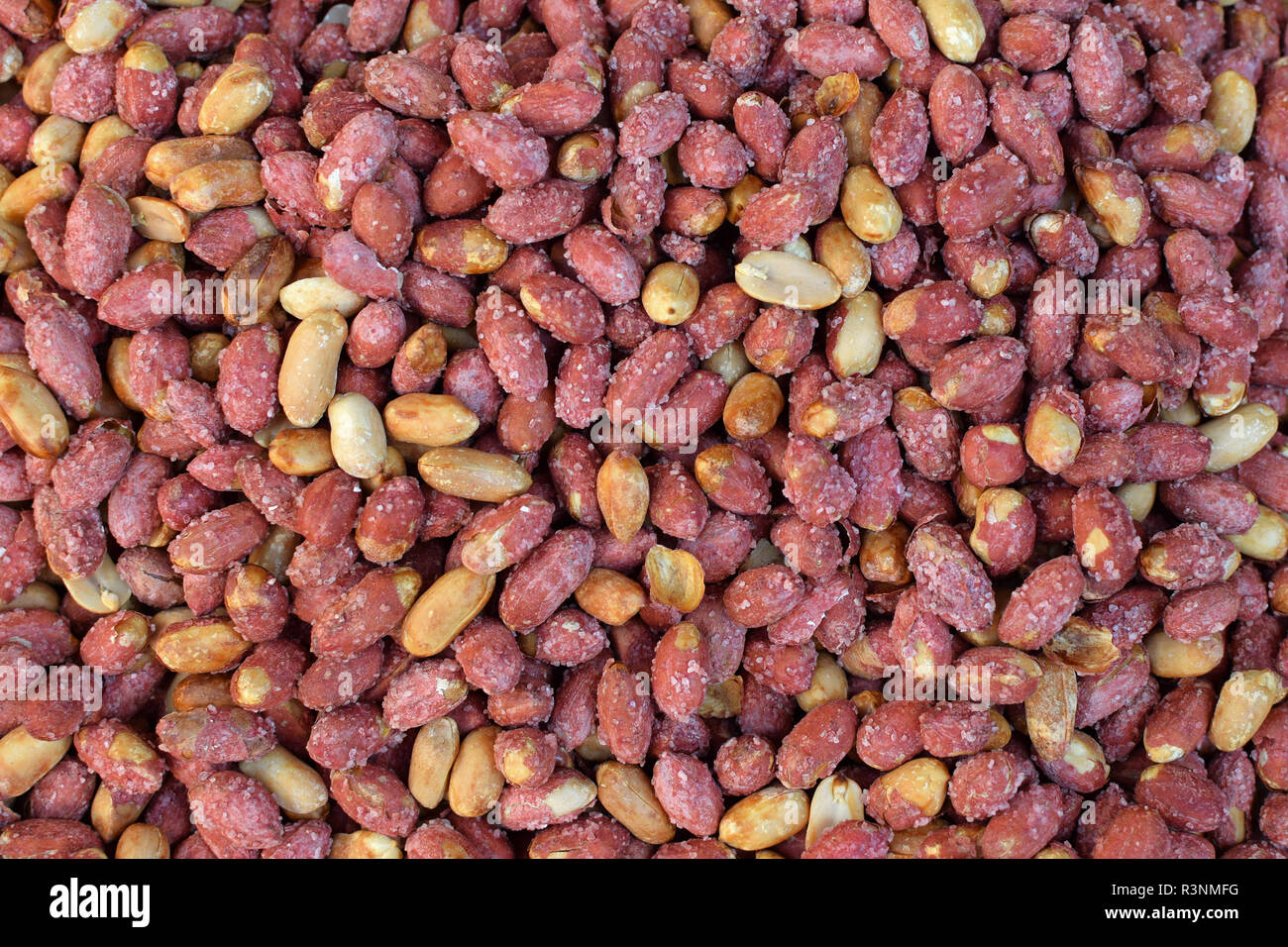 Salted roasted peanuts with red peel. Greek snack food. Stock Photo