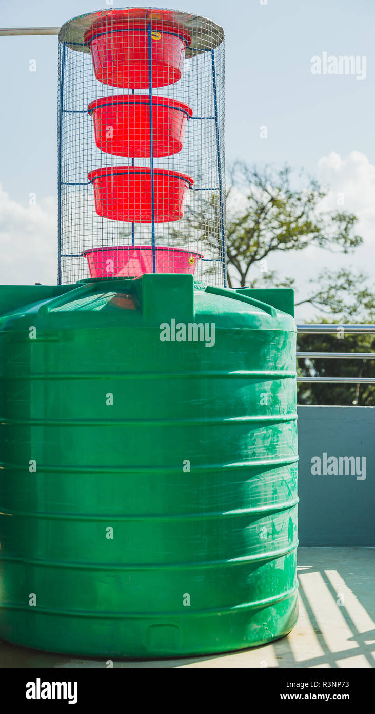 Ancient style water filter on top of the house in kathmandu Stock Photo