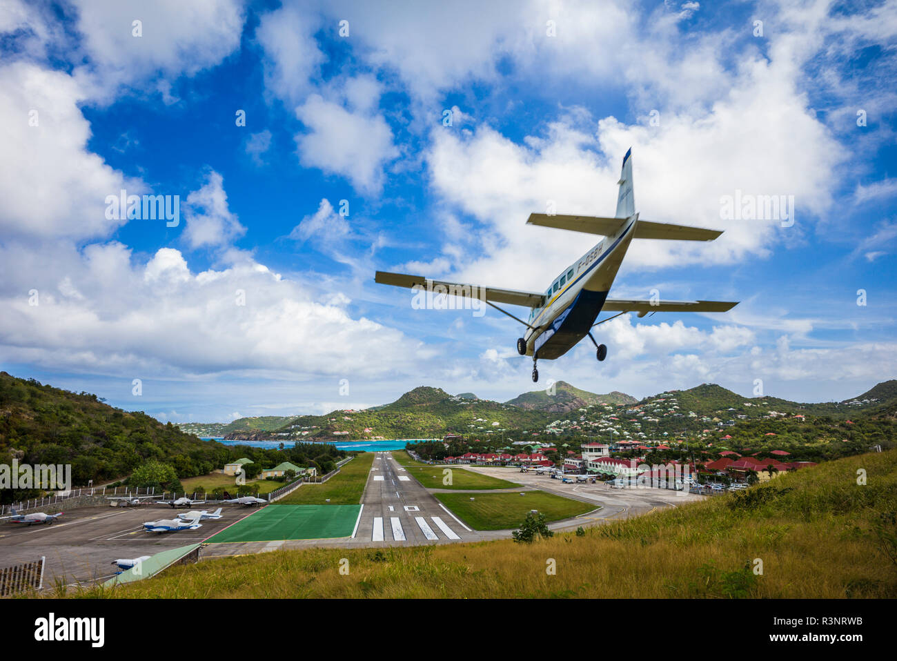 French West Indies, St-Barthelemy. Gustavia, aircraft landing at  St-Barthelemy Airport (SBH Stock Photo - Alamy