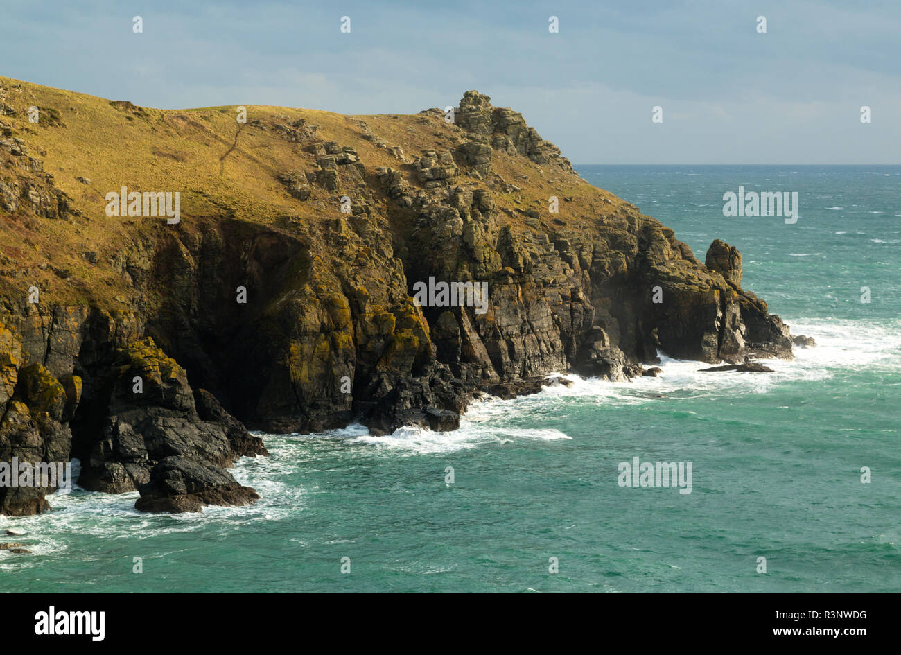 Housel Bay on the Lizard Coast of Cornwall looking towards the headland of Pen Olver Stock Photo