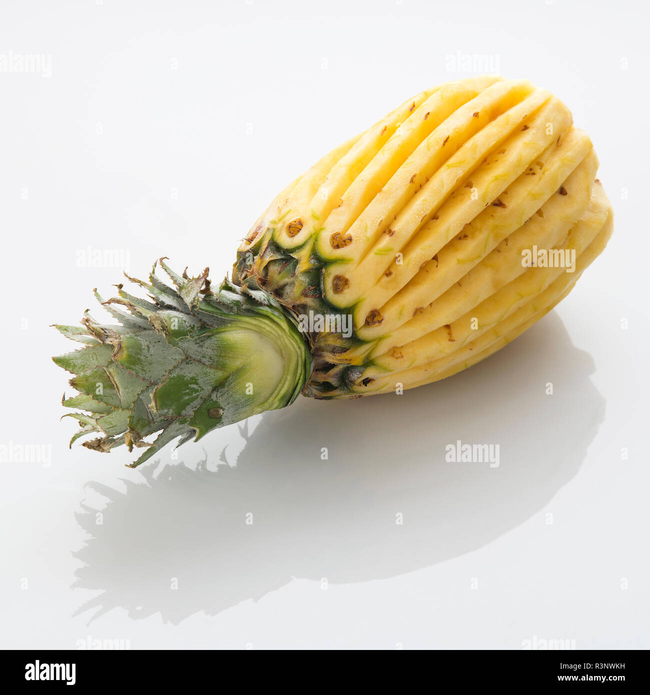 Fruit: Fresh Peeled Pineapple Isolated on White Background Stock Photo
