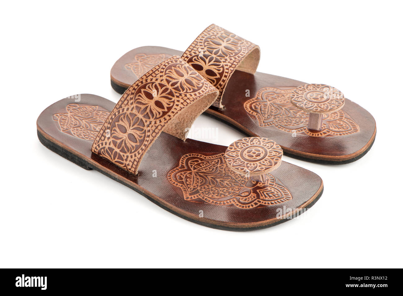 Leather women sandals of ethnic design from India Stock Photo - Alamy