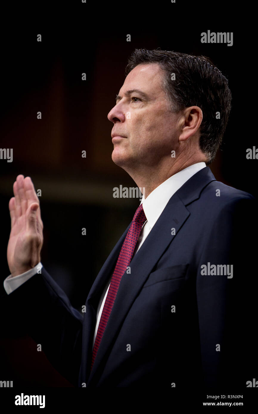 Former FBI Director James Comey testifies in front of the US Senate Intelligence Committee as part of the Committees investigation into what involvement Ruissia had in the election of Donald Trump as the US President. Stock Photo