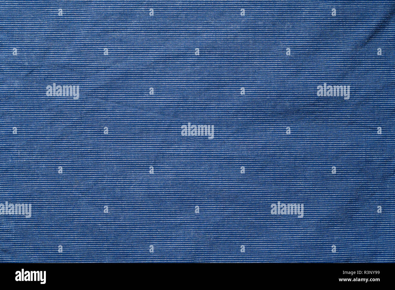 The texture of blue fabric for shirts. Blank textile background Stock Photo