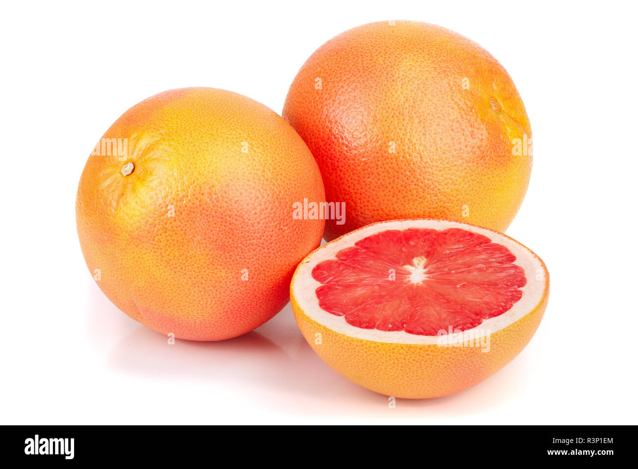 grapefruit and half isolated on white background Stock Photo Alamy
