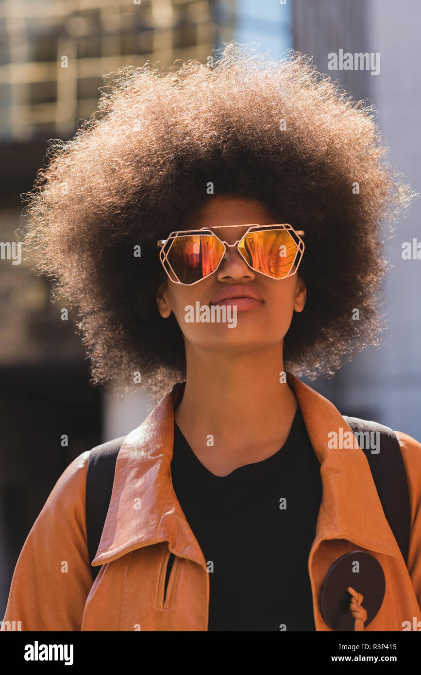Young afro woman backpack hi-res stock photography and images - Alamy