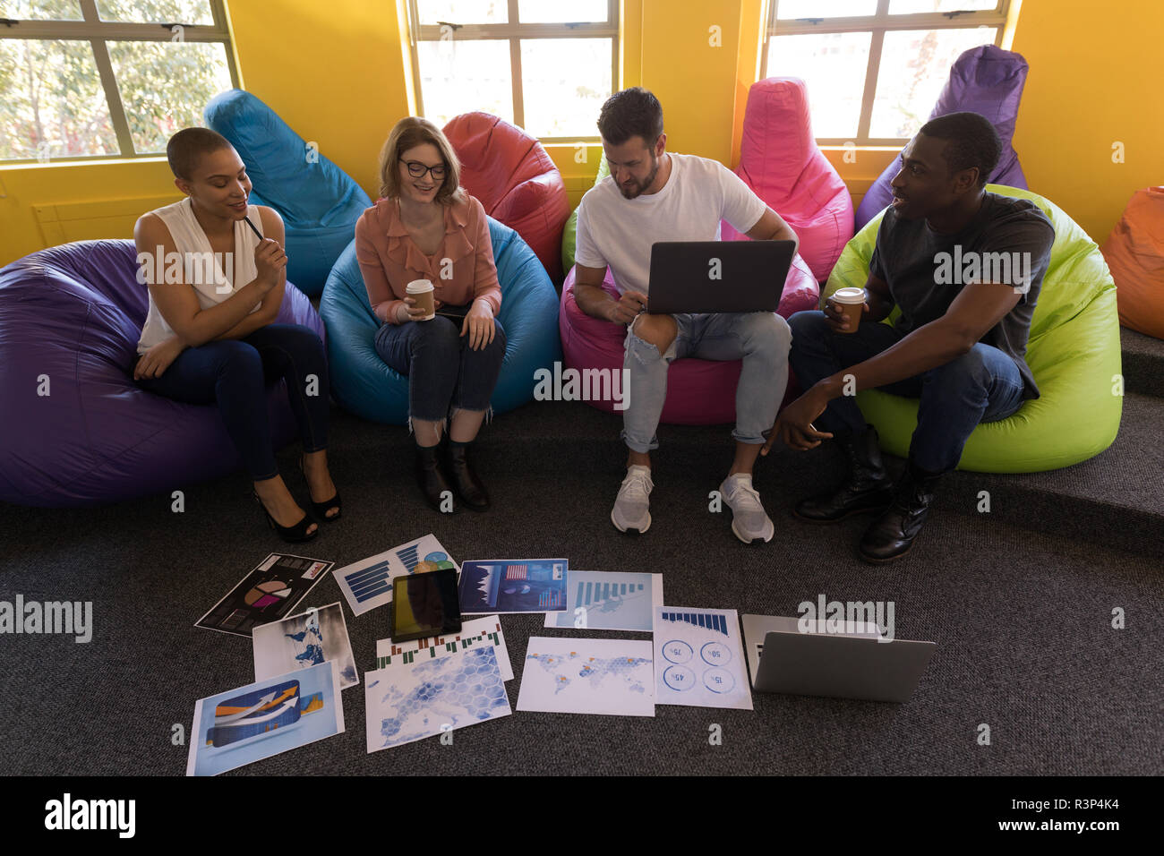 Man sitting on beanbag hi-res stock photography and images - Alamy