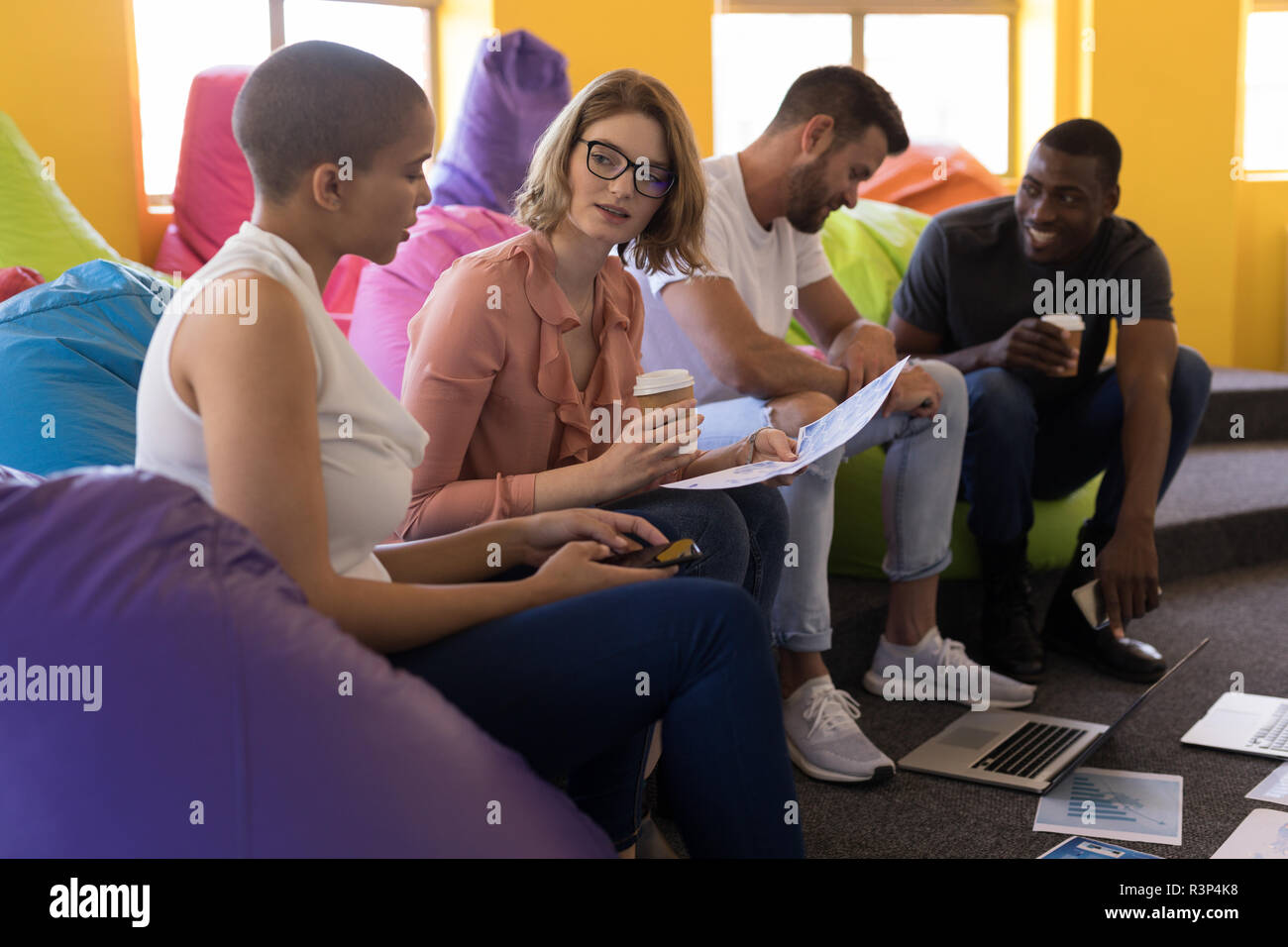 Man sitting on beanbag hi-res stock photography and images - Alamy