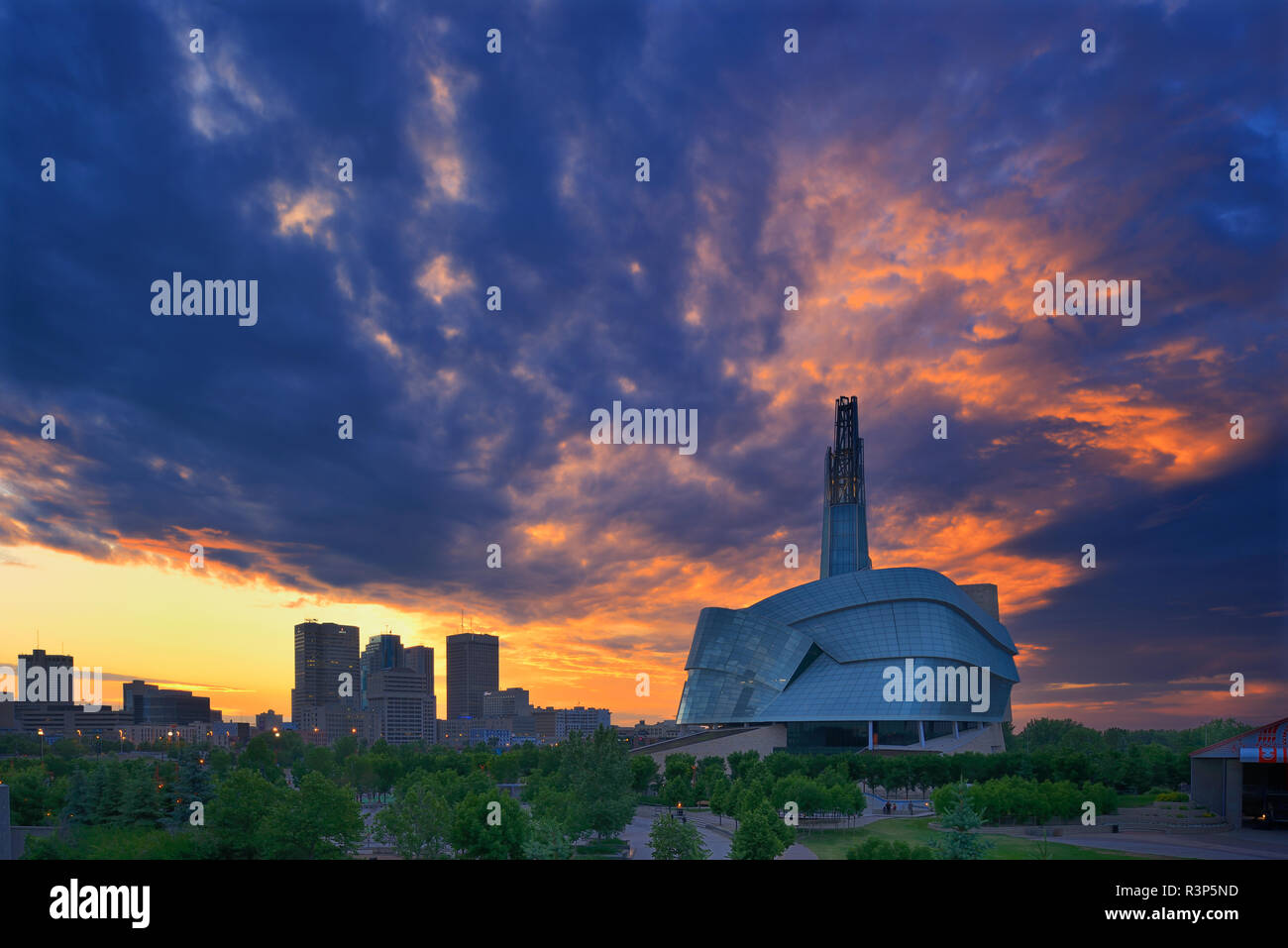 Canada, Manitoba, Winnipeg. City skyline and clouds at sunset. Canada