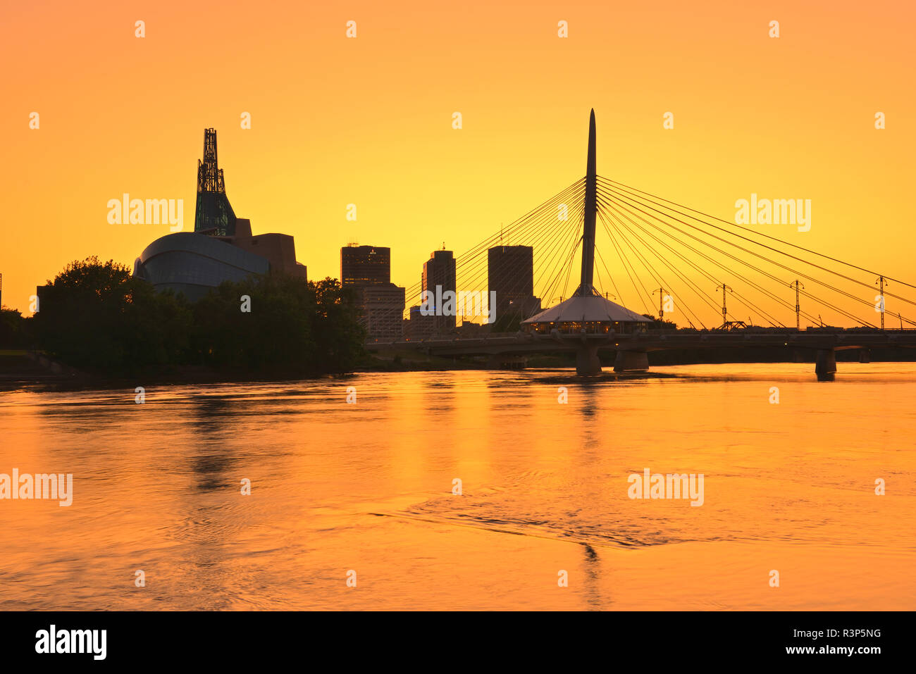 Canada, Manitoba, Winnipeg. Sunset on city skyline and Red River Stock ...