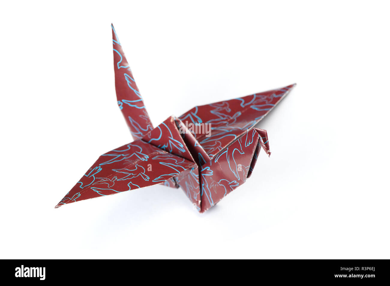 Origami crane isolated on a white background Stock Photo