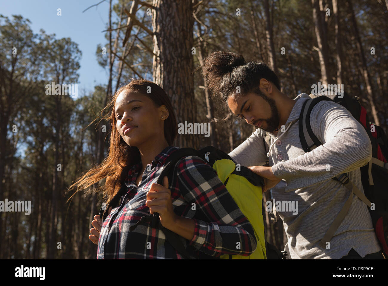Couple camping in the forest Stock Photo