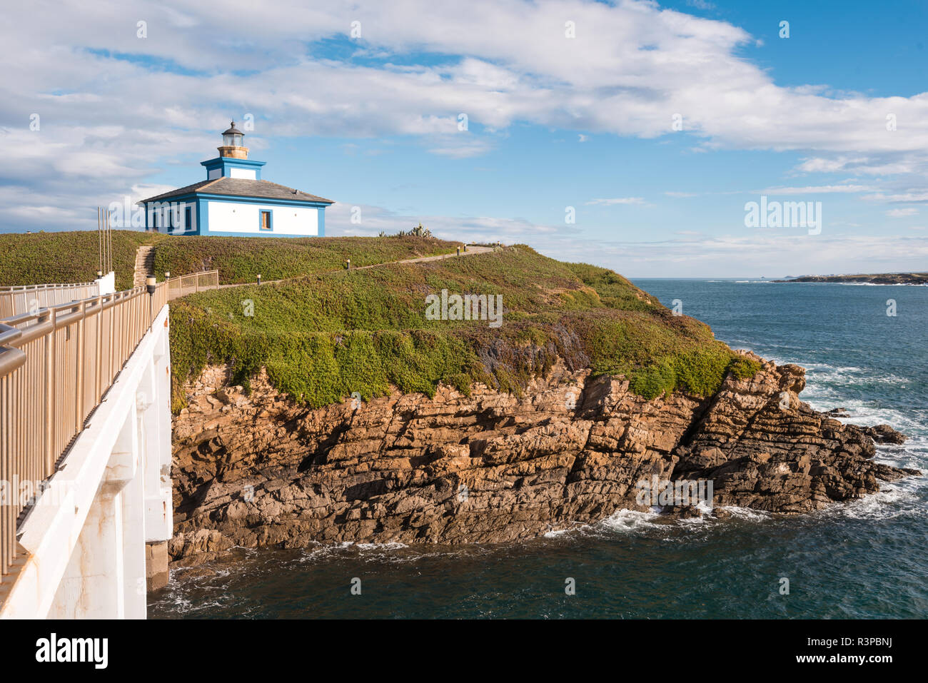 Pancha island lighthouse in Ribadeo coastline, Galicia, Spain. Stock Photo