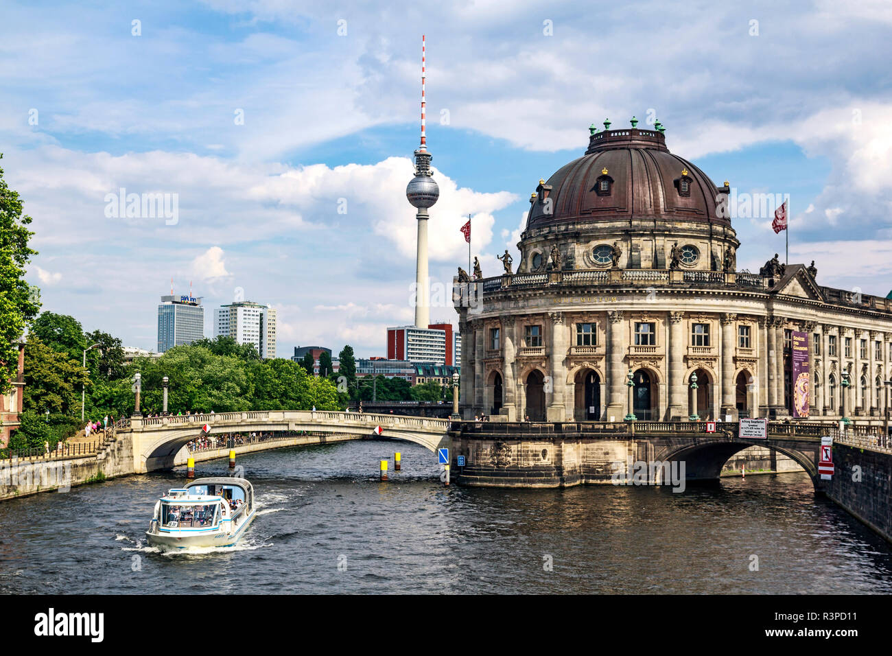 Berlin, Germany. A sight-seeing boat sails past the Bode Museum along ...