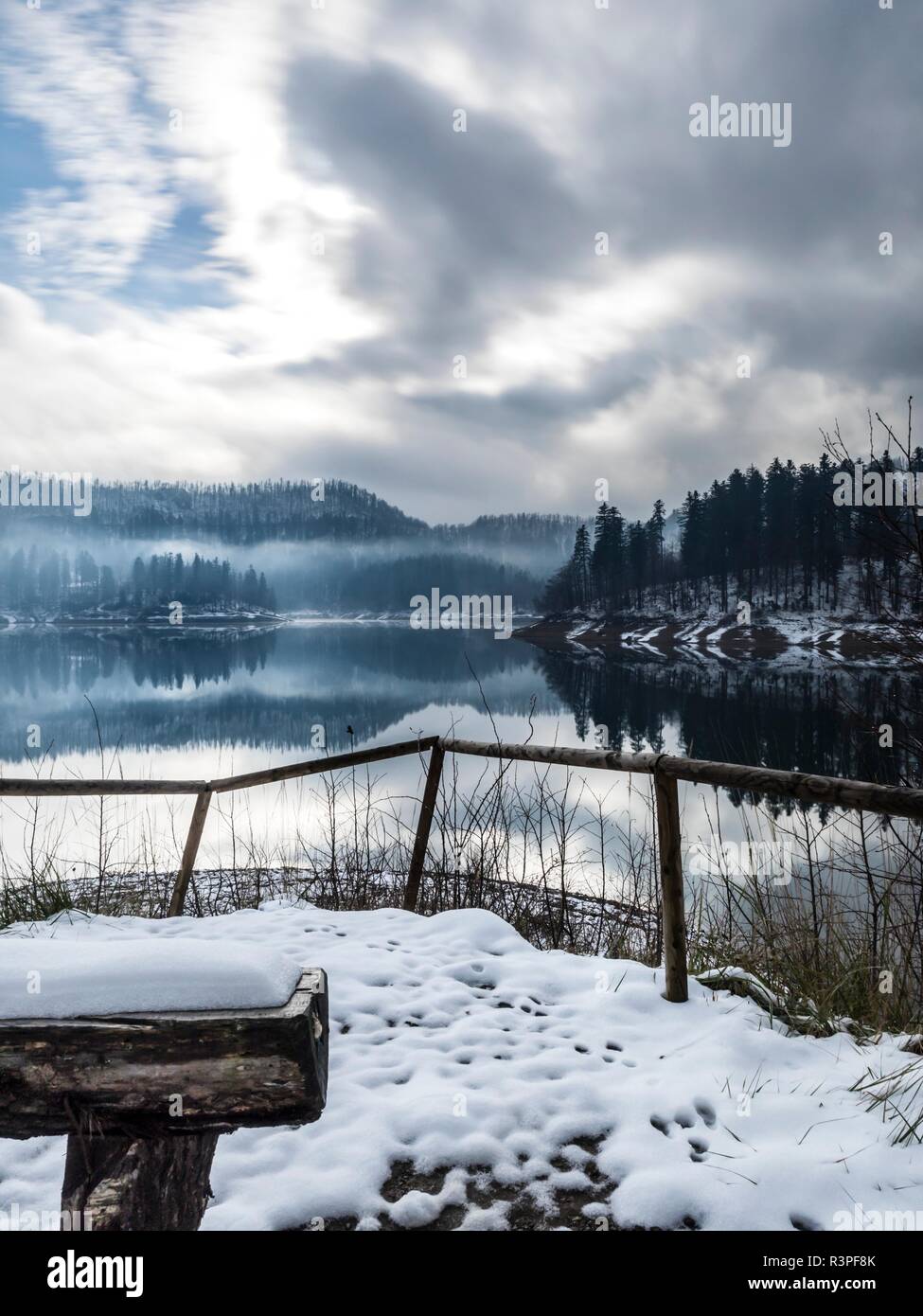 Long exposure early Winter snow in Europe Croatia Lokve lake destination more or less even in on at probably probable but near Stock Photo