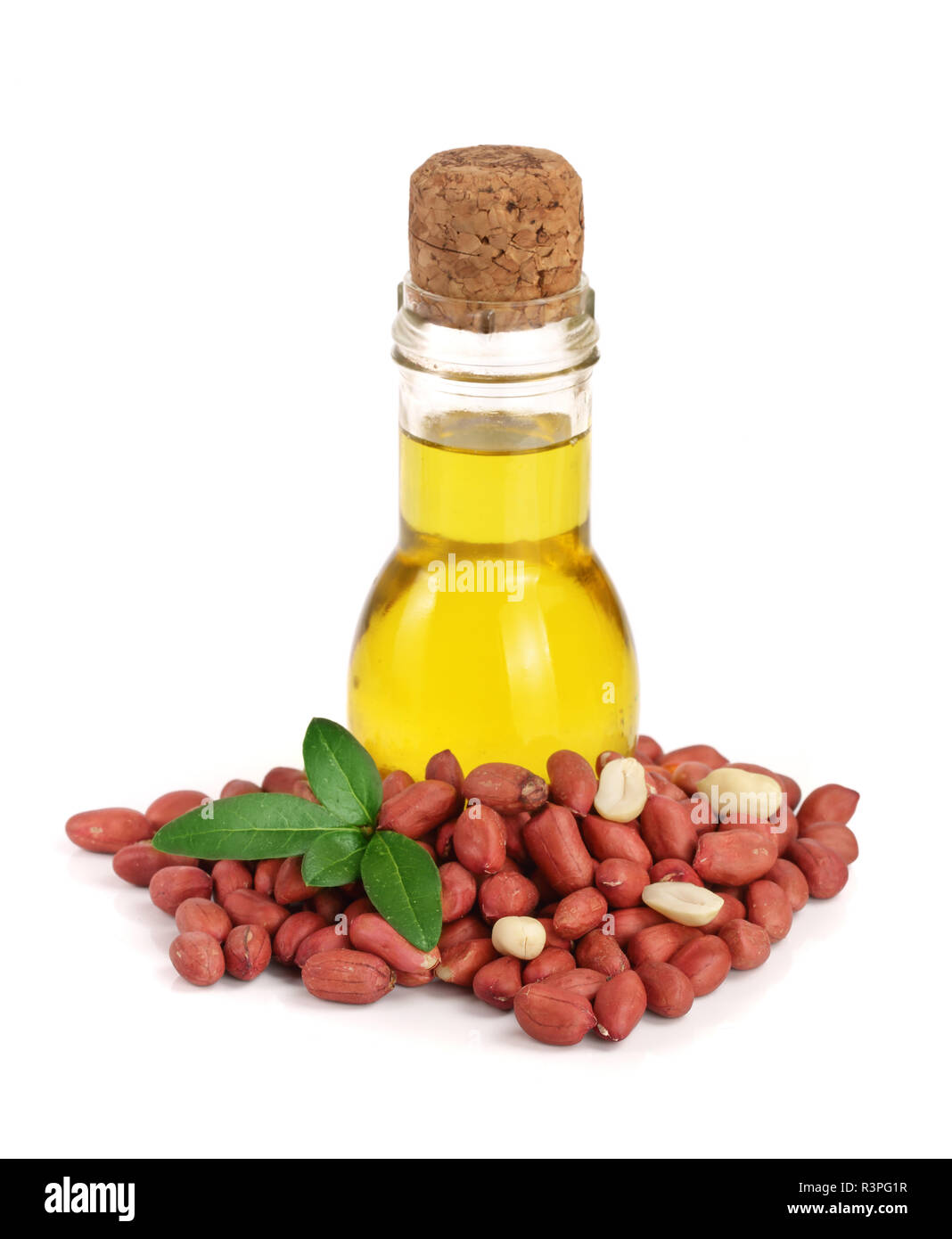 peanut oil in a glass bottle with peanuts Stock Photo Alamy