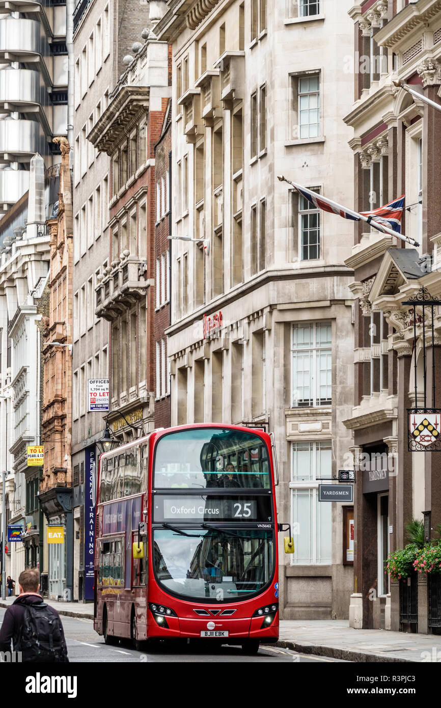 City of London England,UK financial centre center,Cornhill,office commercial buildings,red double-decker bus,man men male,pedestrian,UK GB English Eur Stock Photo