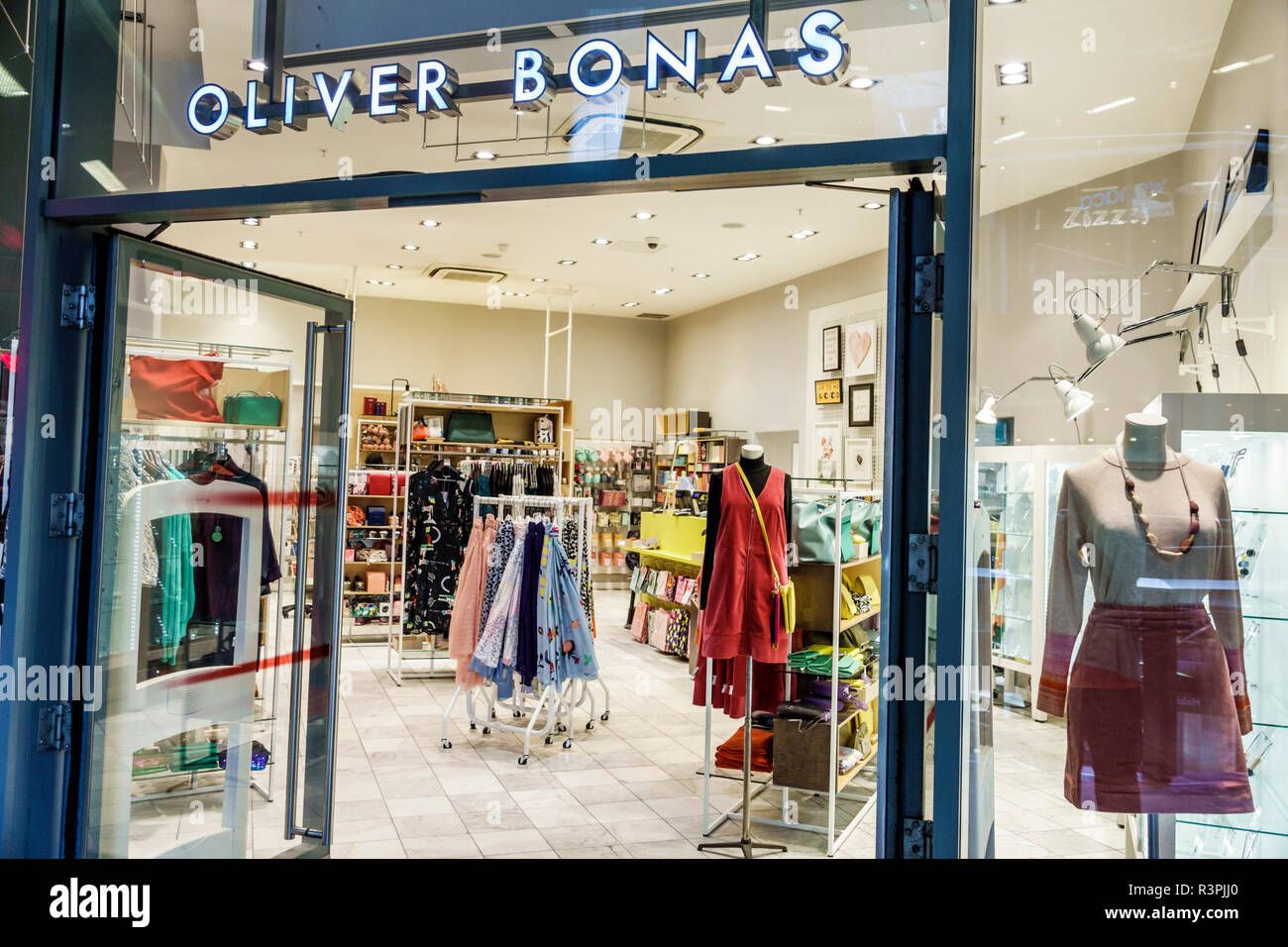 City of London England,UK One New Change mall,centre center,Oliver Bonas,fashion boutique,store,women's clothing,entrance,mannequin,display sale,UK GB Stock Photo
