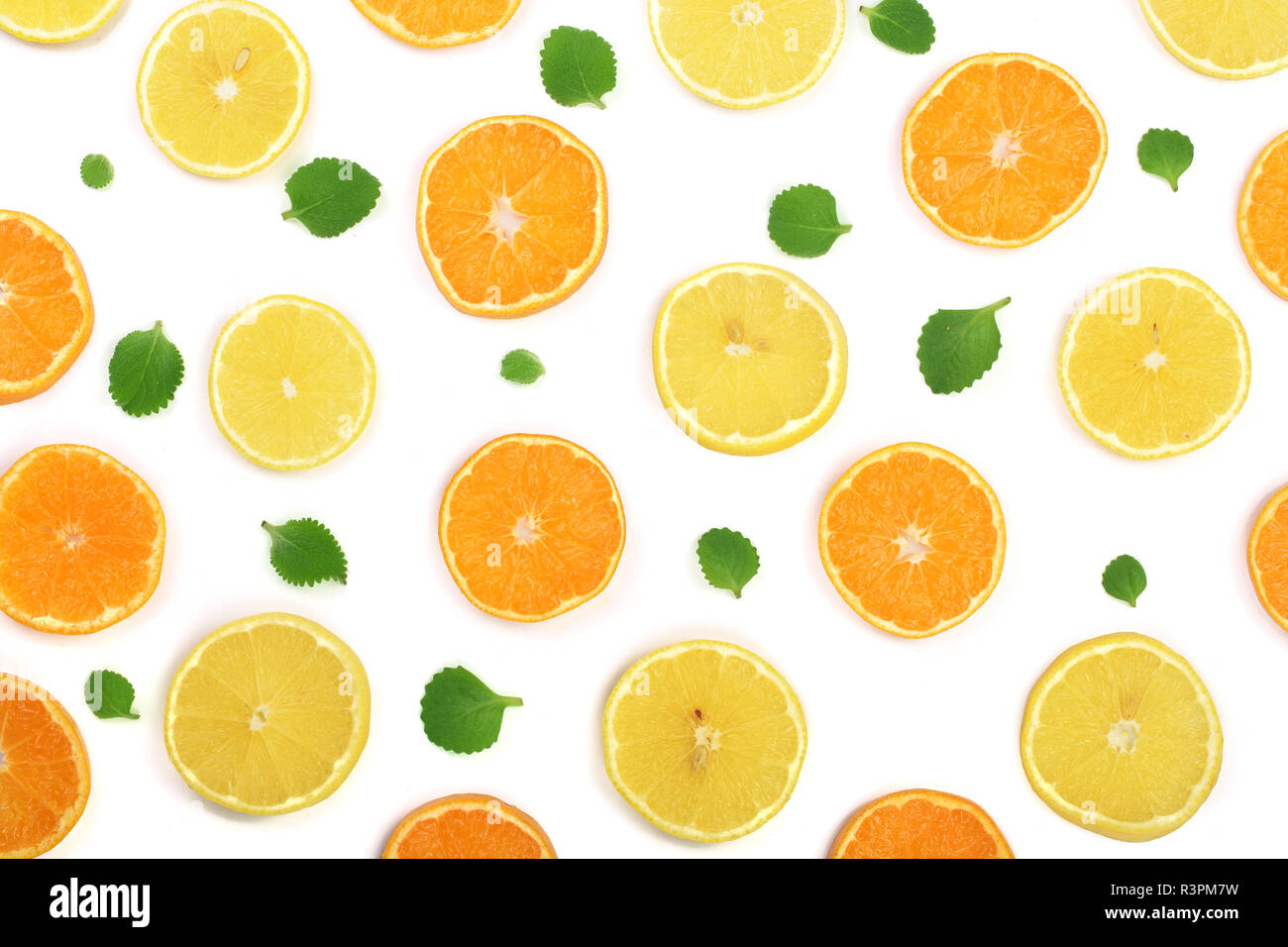 Slices of orange or tangerine and lemon with mint leaves isolated on ...