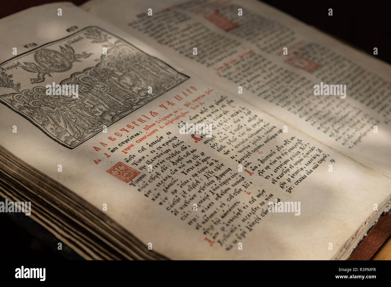 Old Scripture Writing Examples Close up of old Christian manuscript written in Cyrillic on church ...