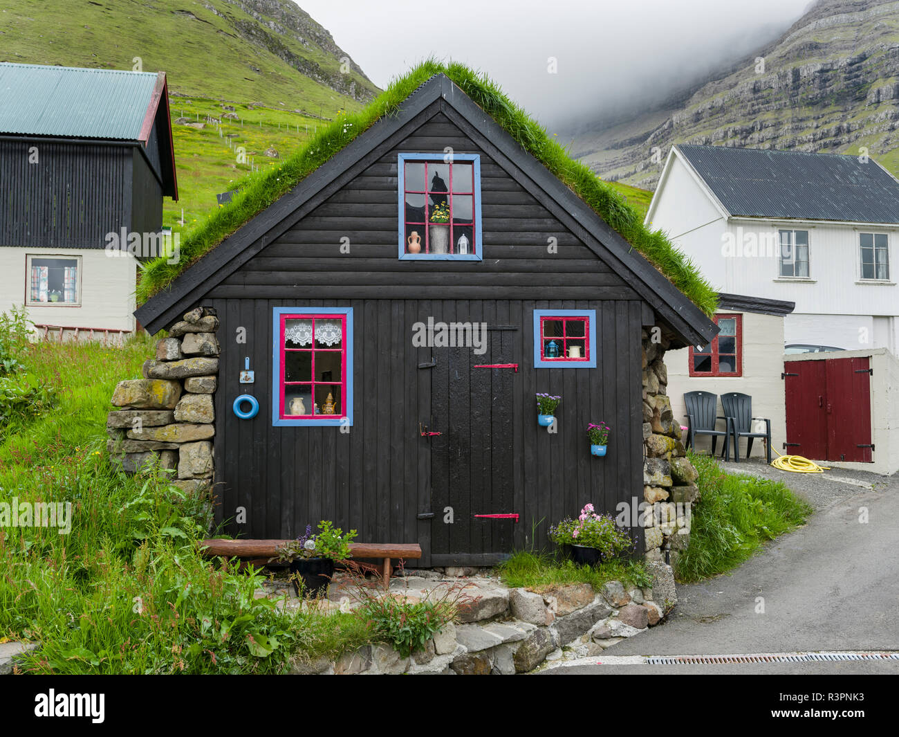 The island of Kunoy with village Kunoy. Faroe Islands, Denmark Stock Photo