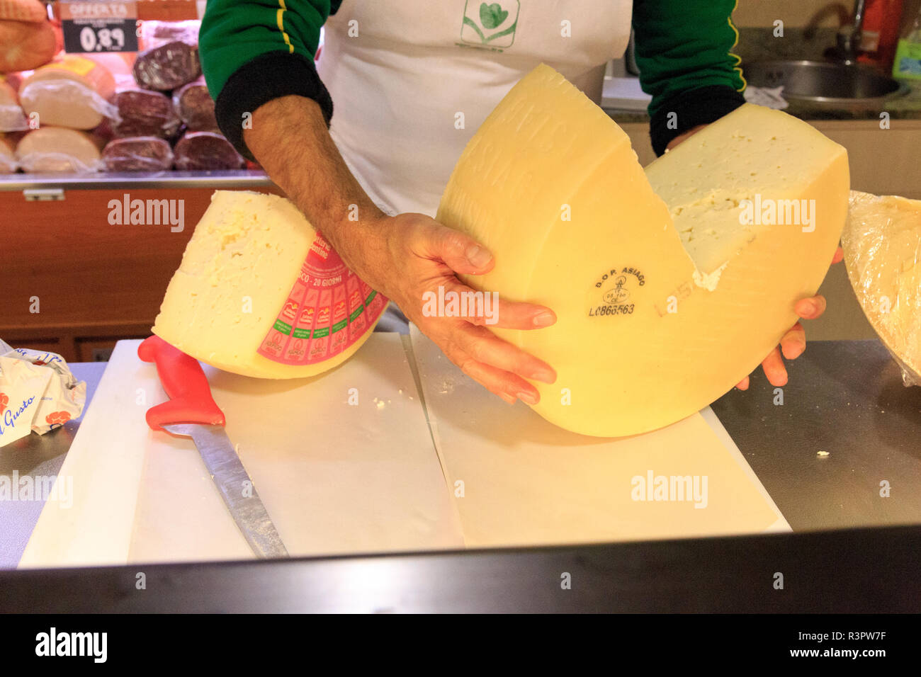 Southern Italy, Puglia. Cheese wheel with wedge cut out. (Editorial Use