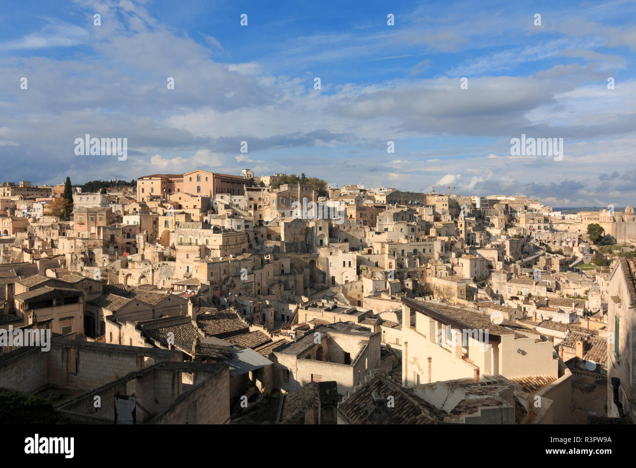 Southern Italy, Basilicata, Province of Matera. The town lies in a small canyon carved out by the Gravina. Overview of town. Stock Photo