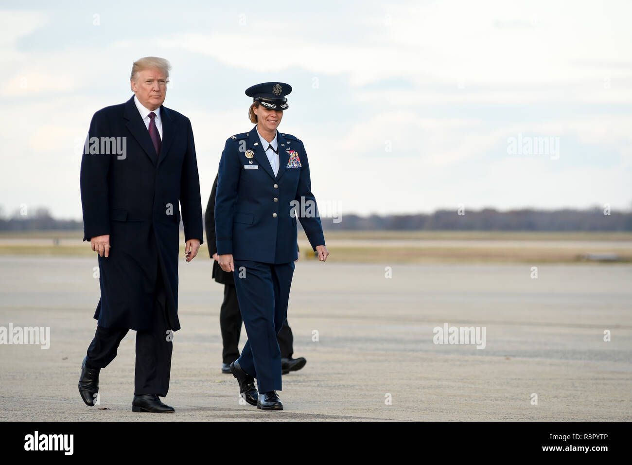 President of the United States Donald Trump is escorted to Air Force One by Col. Rebecca Sonkiss, 89th Airlift Wing commander, Nov. 20, 2018 Joint Base Andrews, Md. (U.S. Air Force photo/Staff Sgt. Kenny Holston) Stock Photo