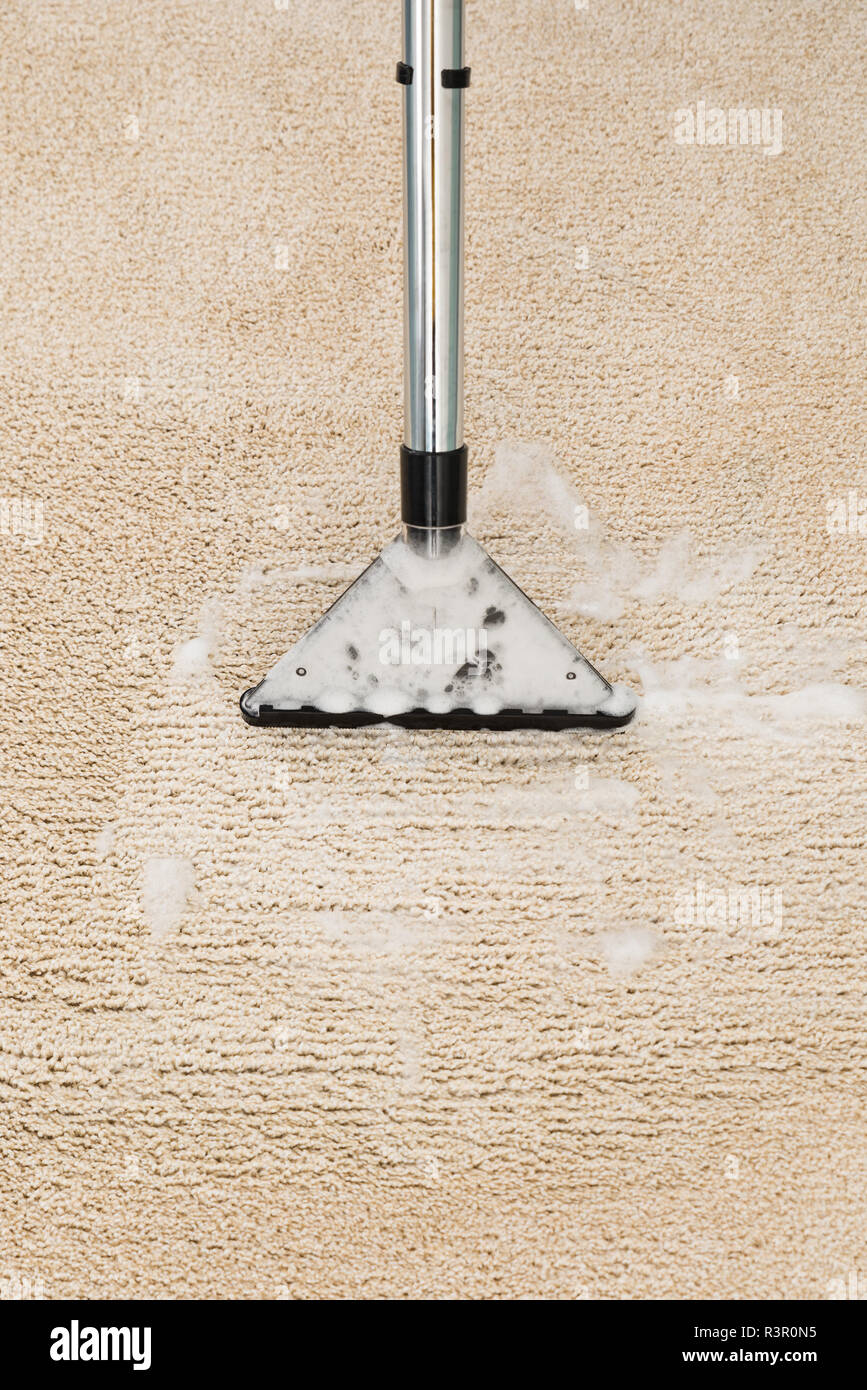 Vacuum Cleaner Over Carpet Stock Photo Alamy