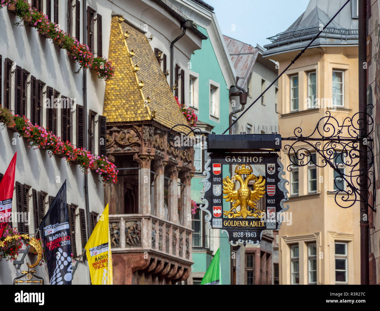 Wrought iron sign 'Gasthof Goldener Adler' in the historic center of Innsbruck, Tyrol, Republic of Austria, Europe Stock Photo