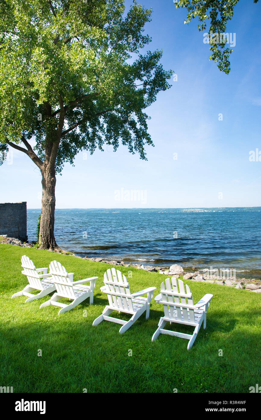 Adirondack chairs for relaxing along the shoreline of Cayuga Lake, Aurora, New York, USA Stock Photo