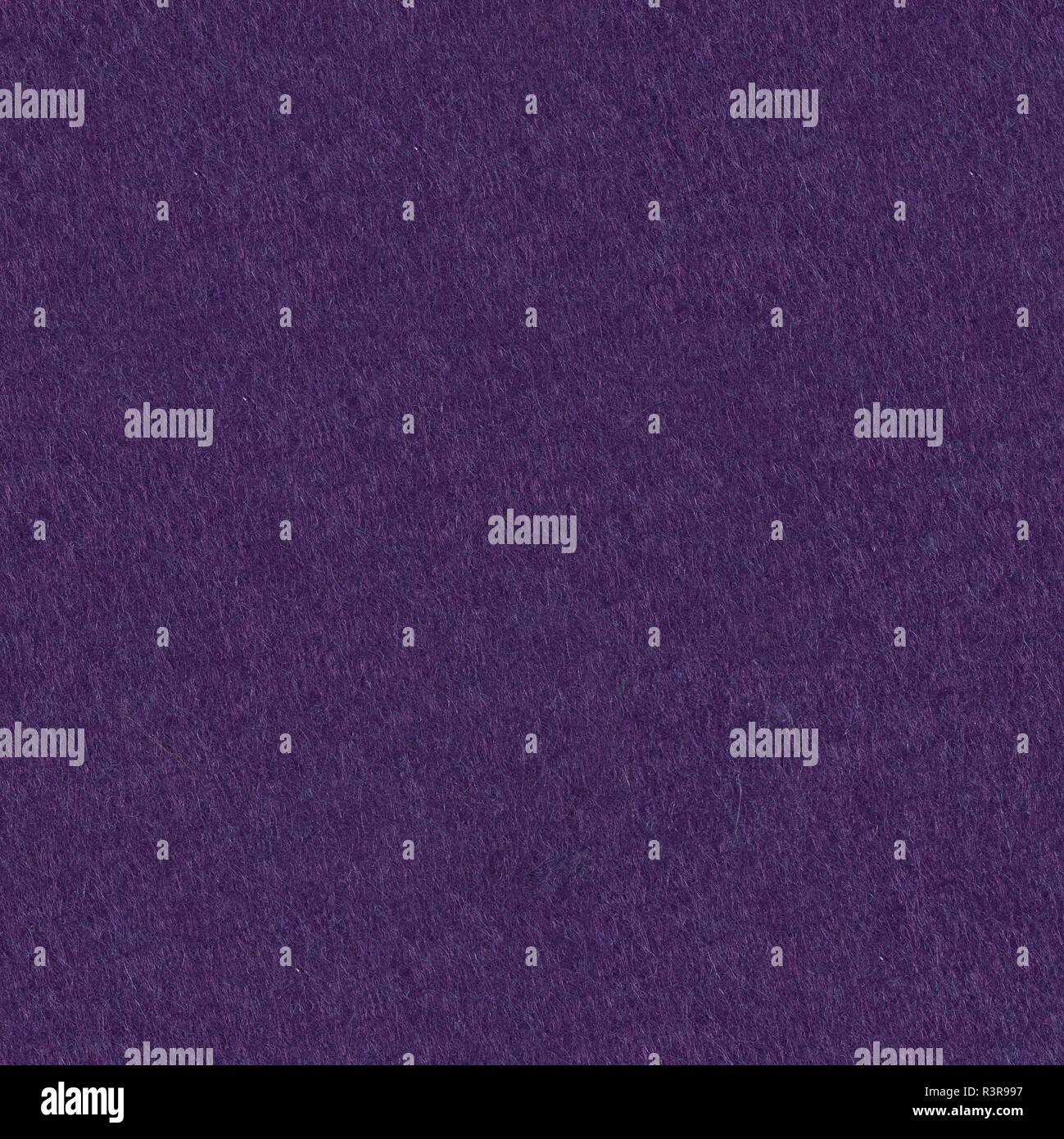 Dark purple felt texture for design. Seamless square background, tile ready. Stock Photo