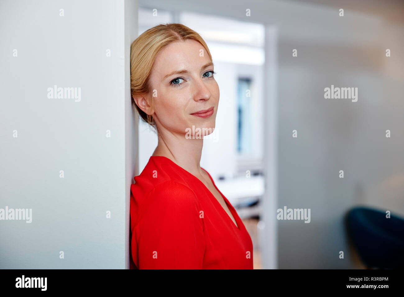 Portrait confident, beautiful young woman Stock Photo - Alamy