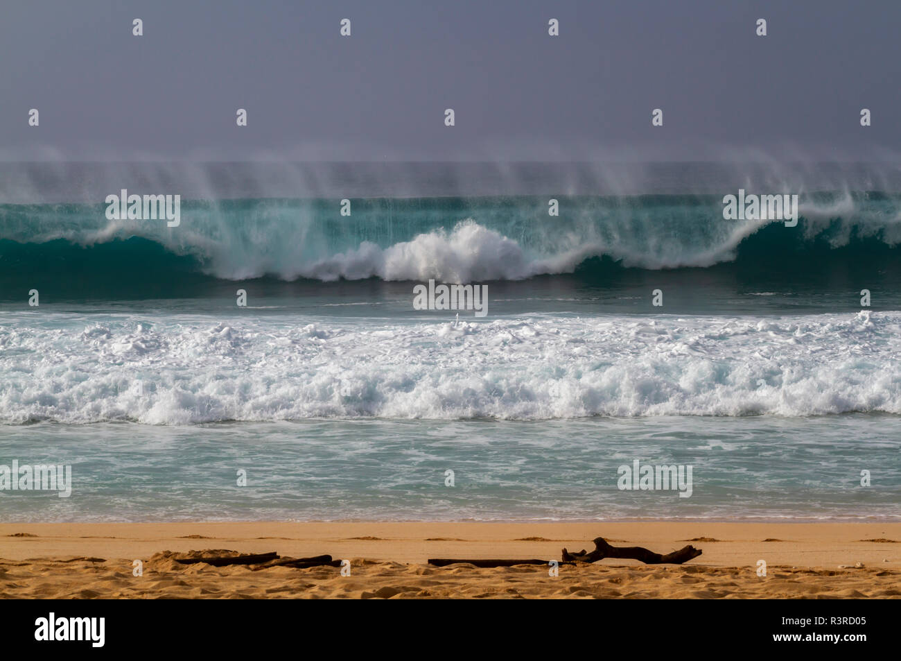 Giant waves crashing on beach hi-res stock photography and images - Alamy