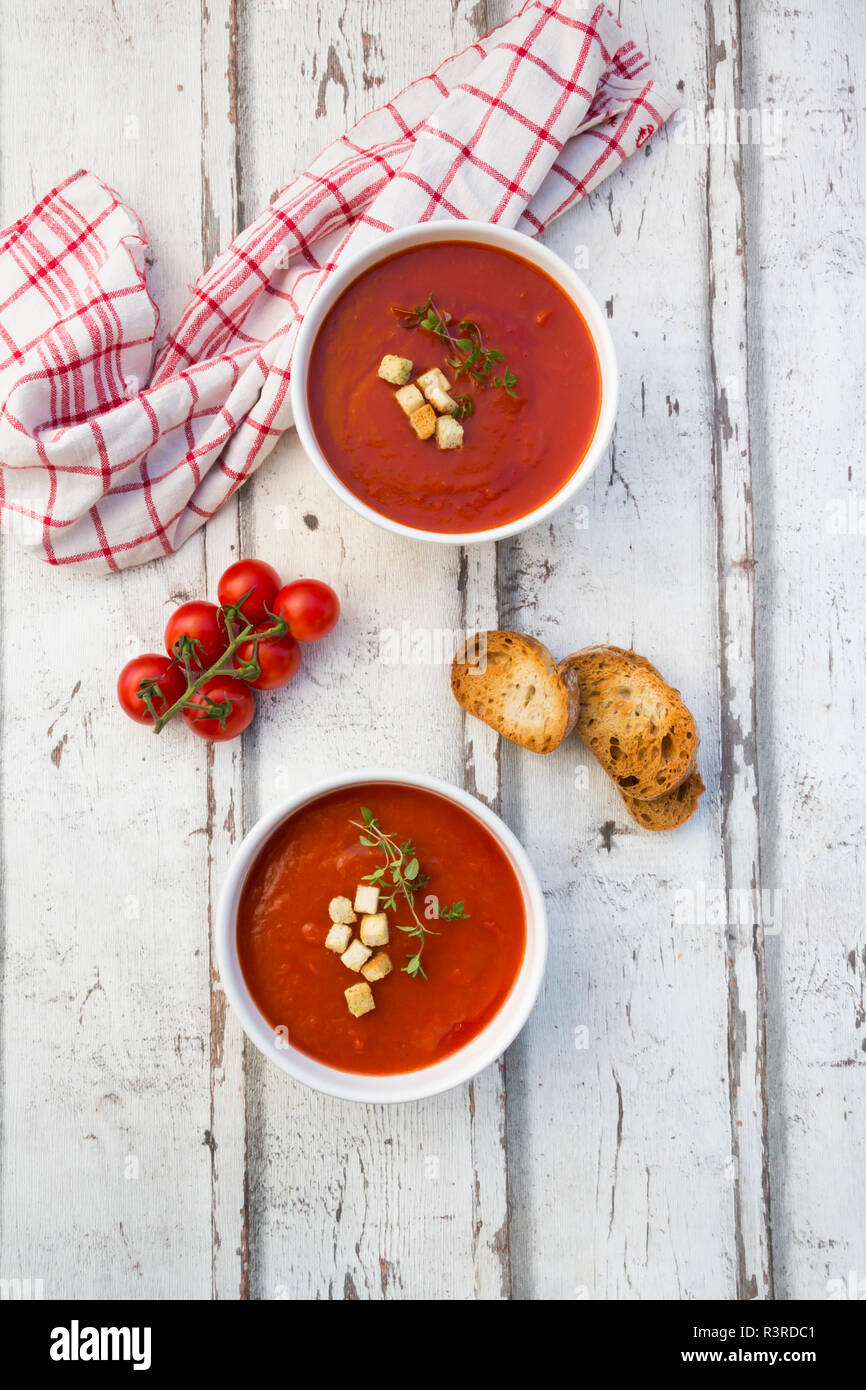 Mediterran tomato soup with roasted bread, croutons and thyme Stock Photo