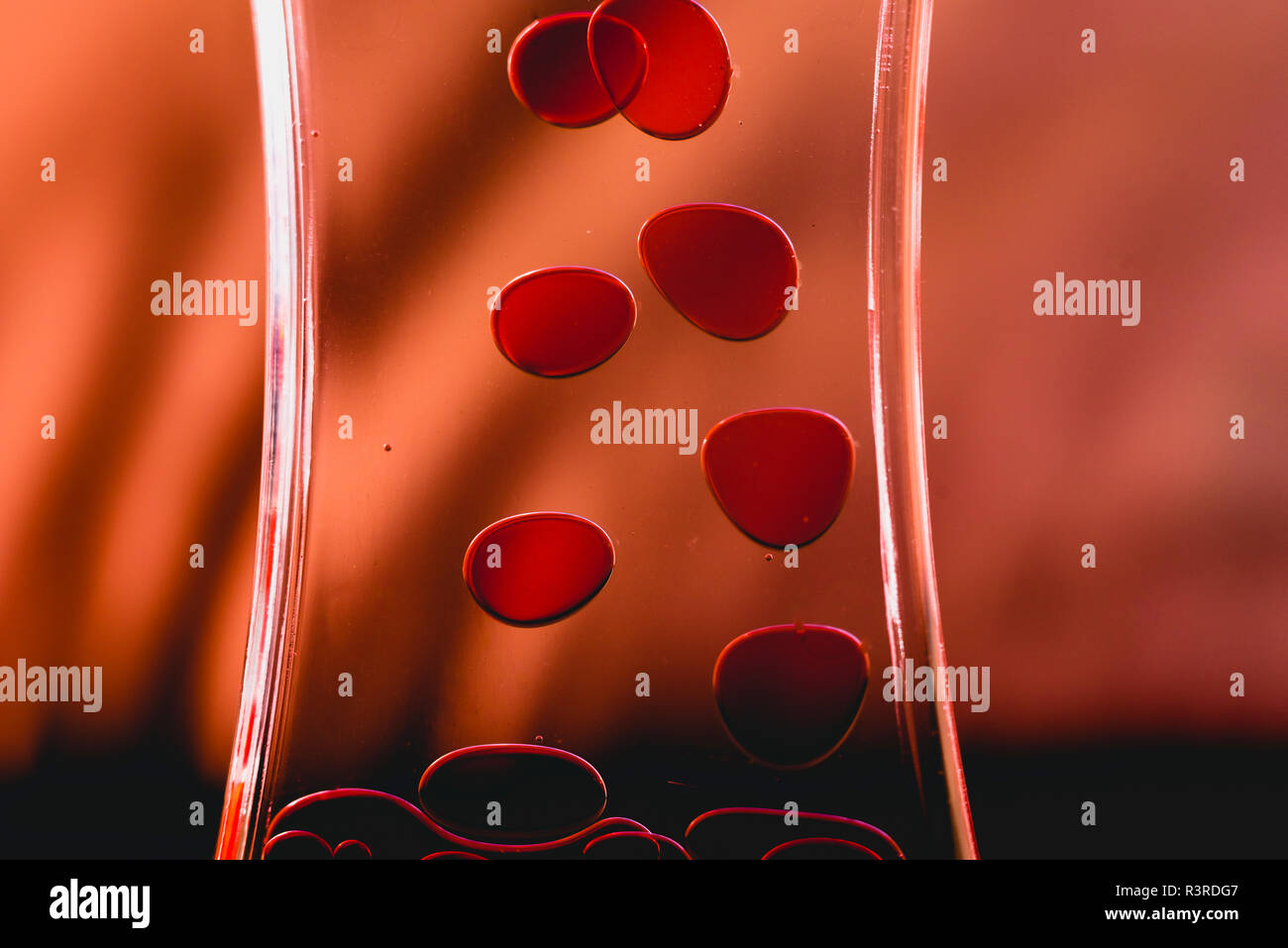 Red drops similar to blood falling in water Stock Photo Alamy