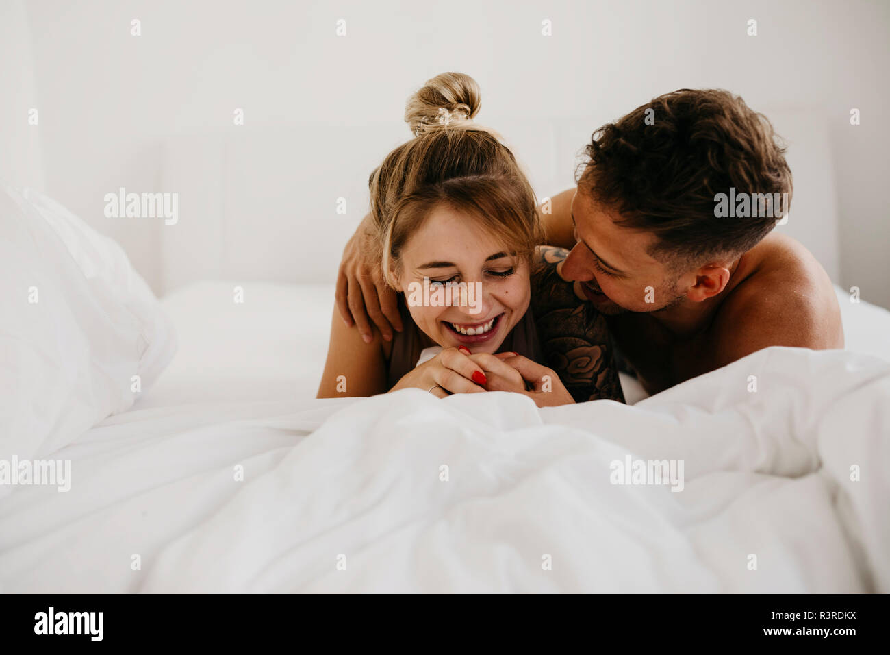 Happy romantic young couple hi-res stock photography and images - Alamy