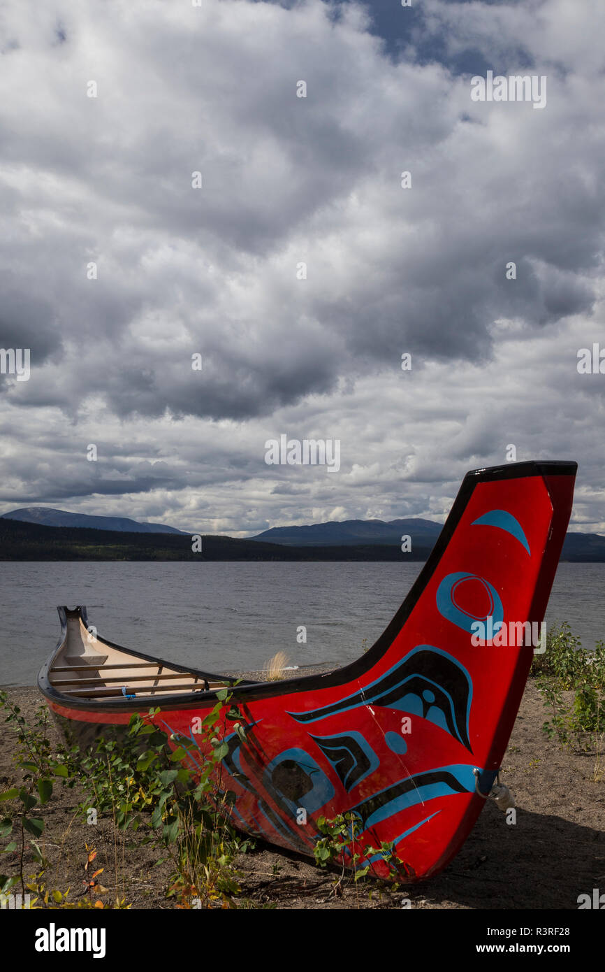 Canada, Yukon, Teslin. Brightly painted canoe. Center Stock Photo Alamy