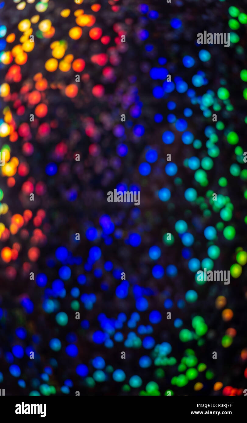 Mulicoloured contrasting sequined bokeh effect Stock Photo