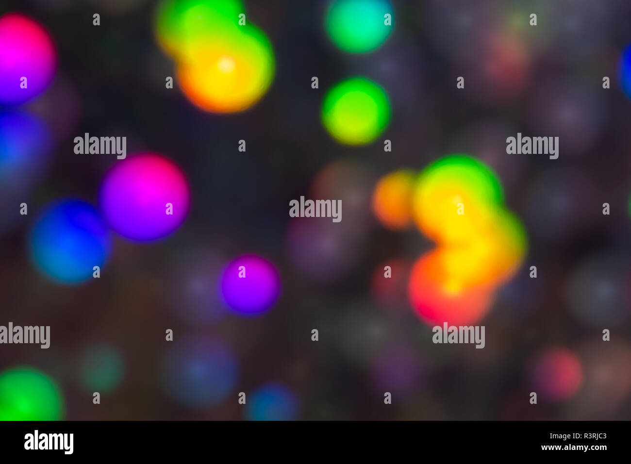 Mulicoloured contrasting sequined bokeh effect Stock Photo