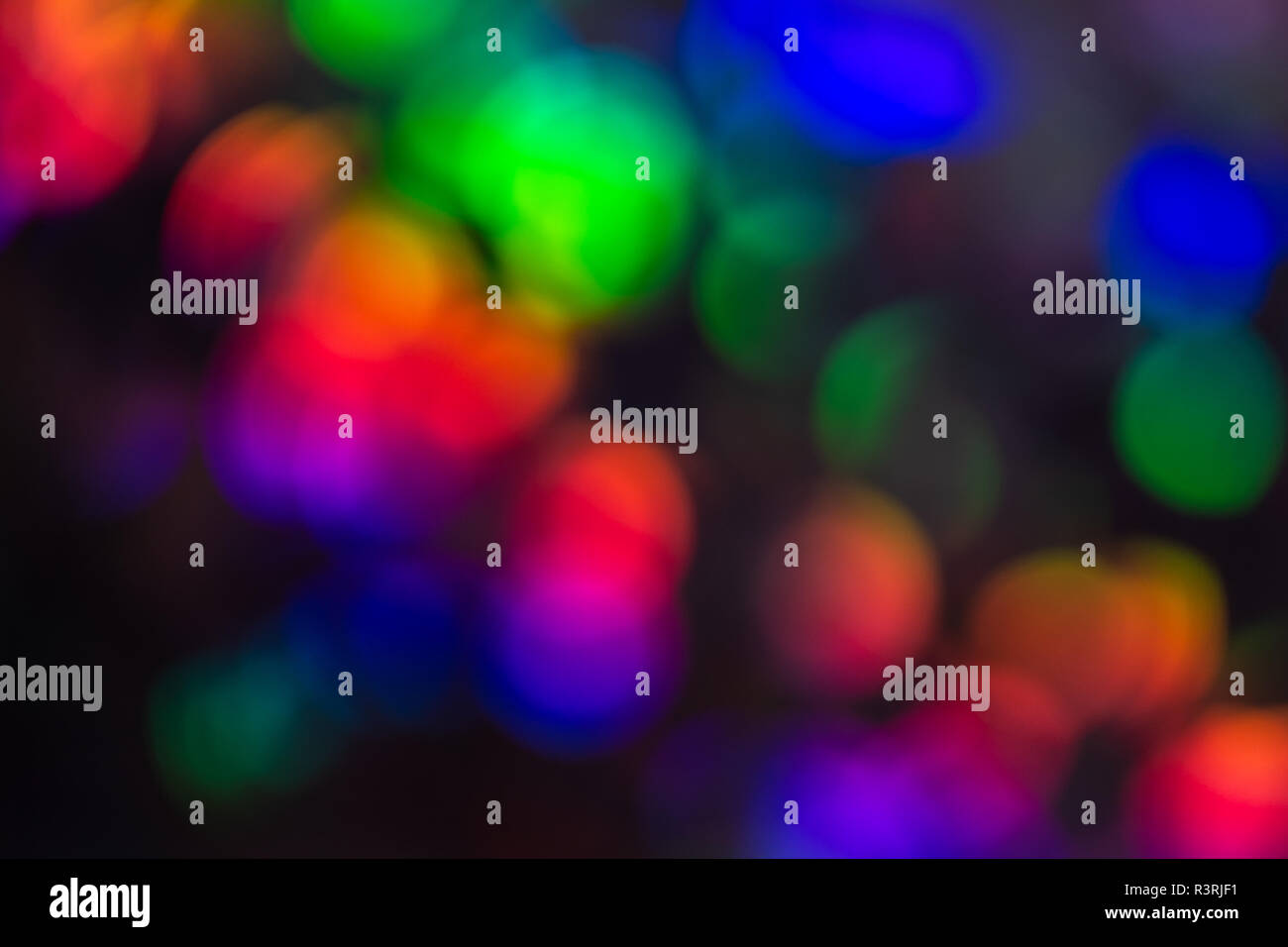 Mulicoloured contrasting sequined bokeh effect Stock Photo