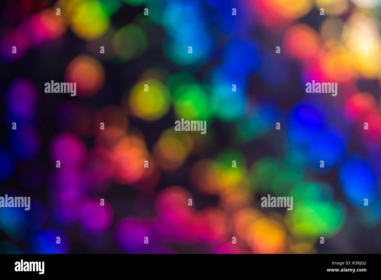 Mulicoloured contrasting sequined bokeh effect Stock Photo